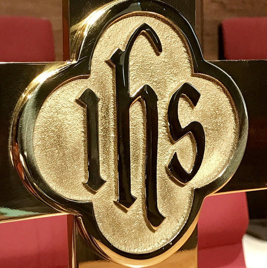 Catholic church interior with sacred atmosphere representing devotion to the Holy Name of Jesus