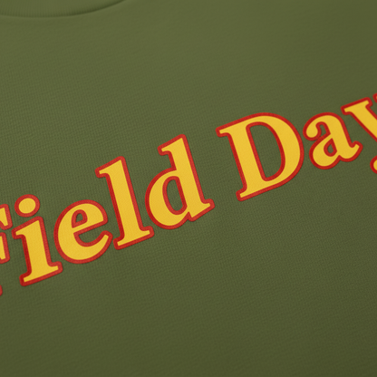 Close-up of Field Day bold red and gold text and premium cotton quality